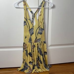 Yellow patterned flowy romper.